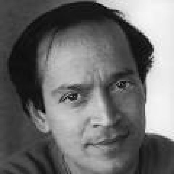 1996:  Headshot portrait of Indian writer Vikram Seth smiling.  (Photo by Horst Tappe/Hulton Archive/Getty Images)